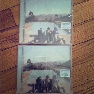 Jonas Brothers “Happiness Begins” CDs.
